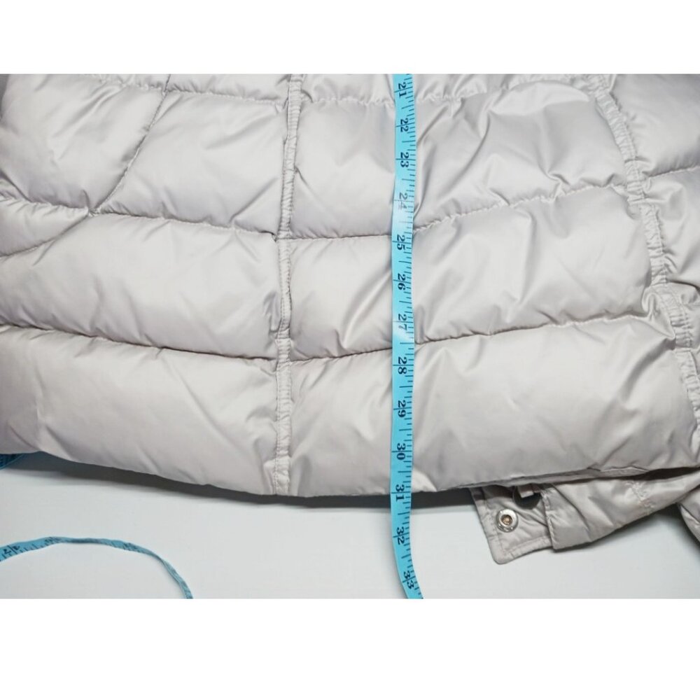 Long winter puffer coat with duffle button design with a zip closure - Picture 13 of 15